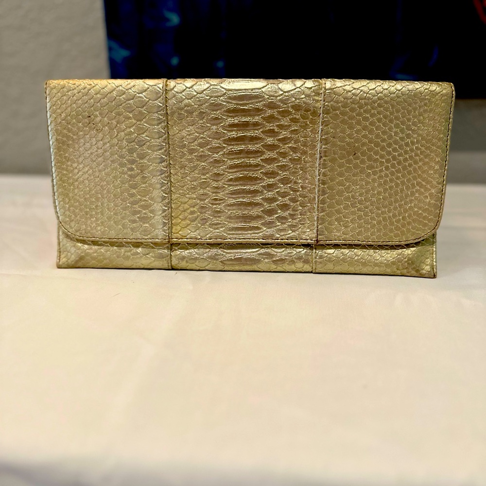 Gold snakeskin clutch